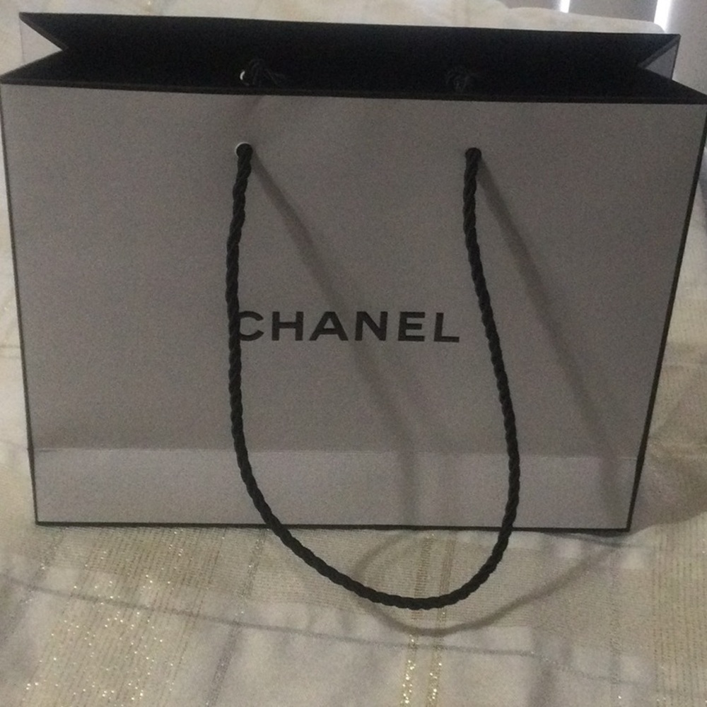 Chanel empty paper bag.